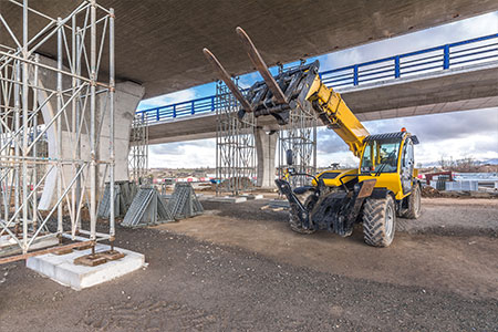 An industrial telescopic handler on a building site