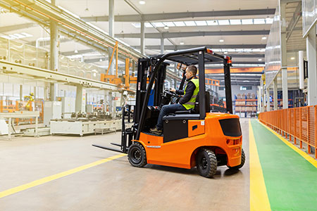 An industrial counterbalance truck in a warehouse