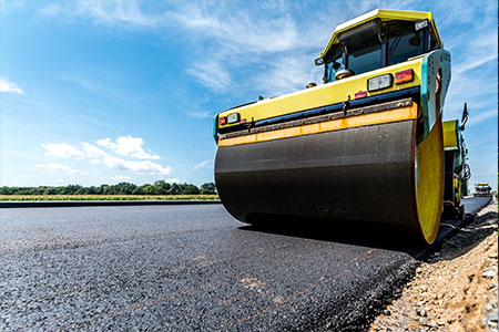 A road roller on a road