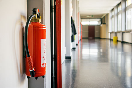 A fire extinguisher in a school